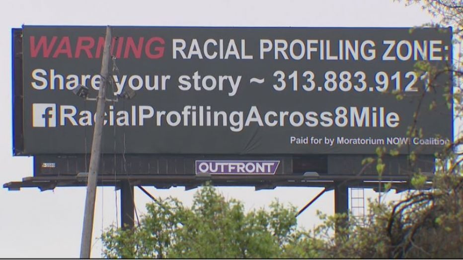 sign on eight mile asking for people to share their racial profiling experiences